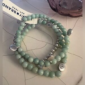 Lucky Brand jade colored beaded and silver tone bracelet